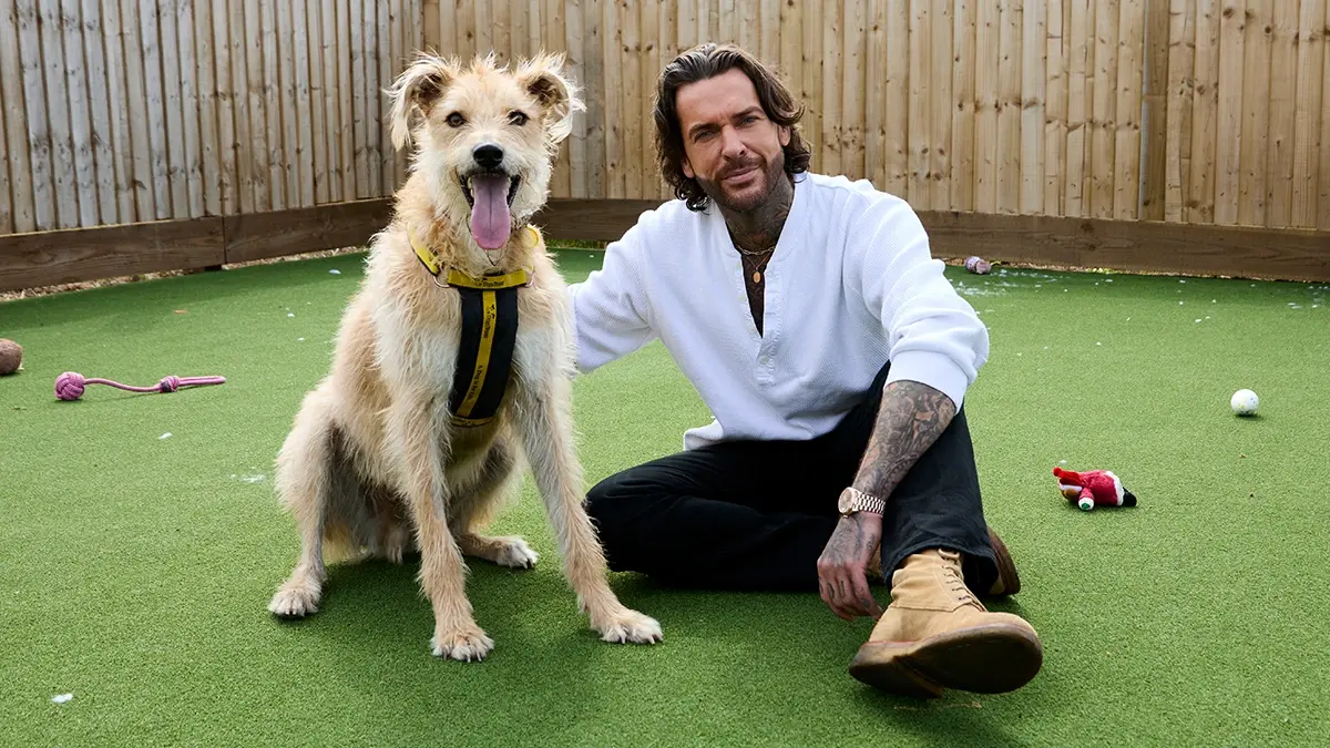 Pete and a furry friend in Pete Wicks: For Dogs’ Sake, available in On Demand this month.