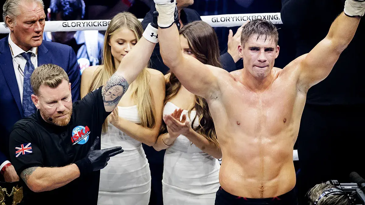 Record-breaking kickboxing champ Rico Verhoeven celebrates a victory.