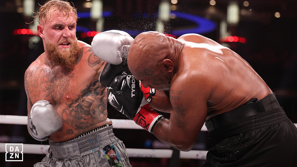 Jake Paul in the ring with former world heavyweight champ Mike Tyson. Watch Paul v Chávez on DAZN with Virgin Media.