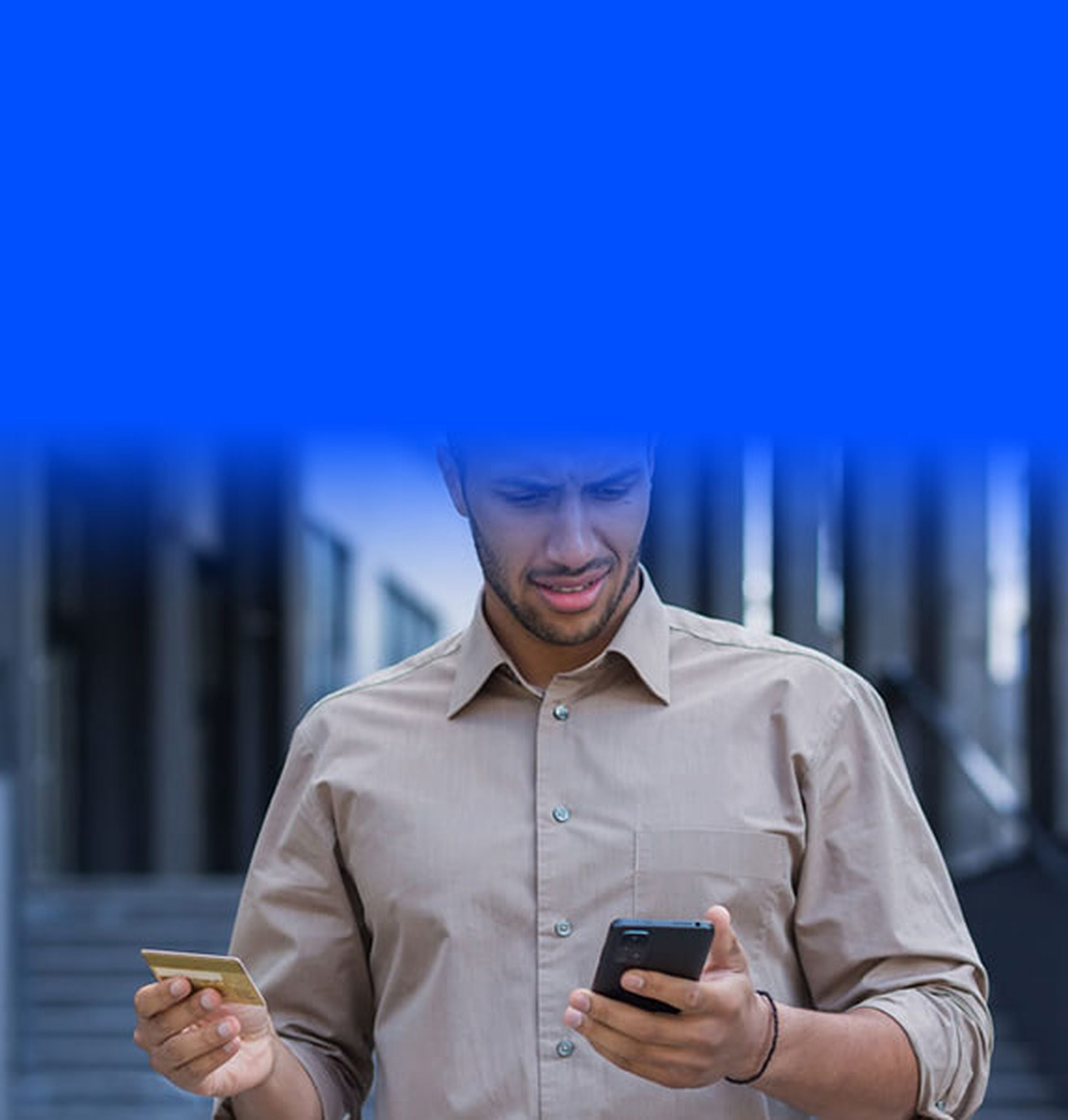 Man holding phone wearing business suit