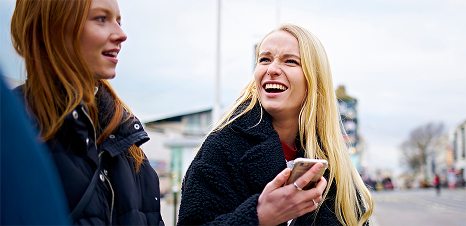 Women holding phone