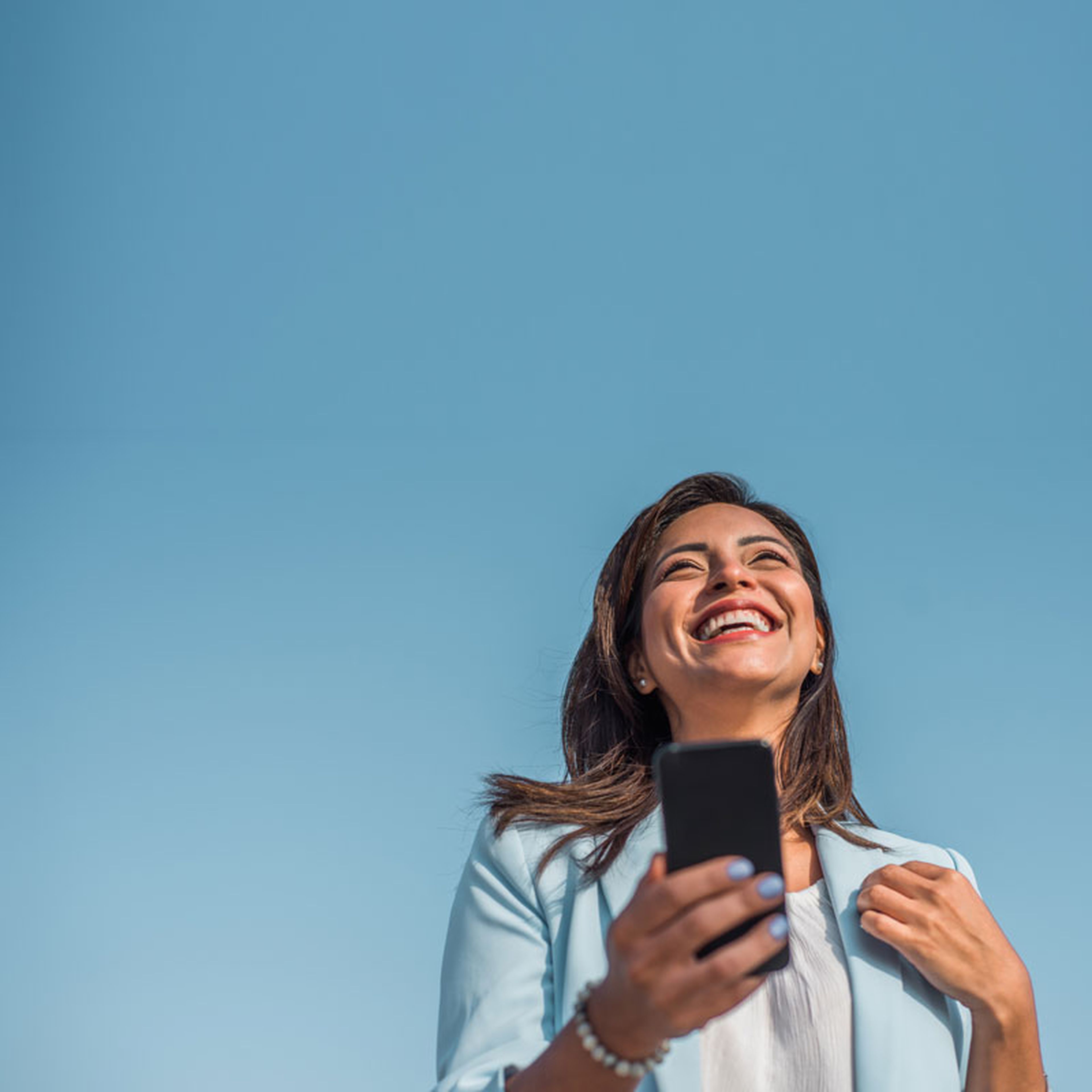 Woman smiling and looking up