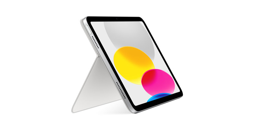 Tablet with a colorful screen on a white stand, displaying yellow, pink, and blue circles on a white background.