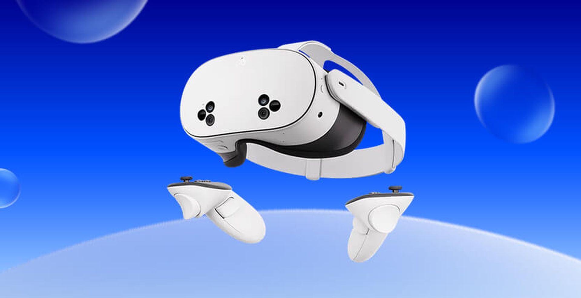 A white virtual reality headset and controllers float against a blue background with soft bubbles.