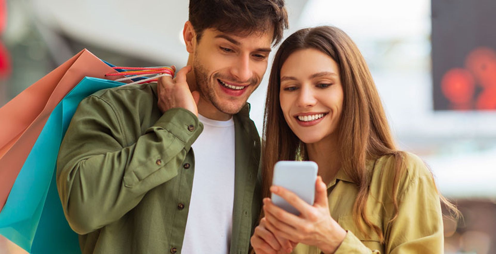 Smiling couple shopping
